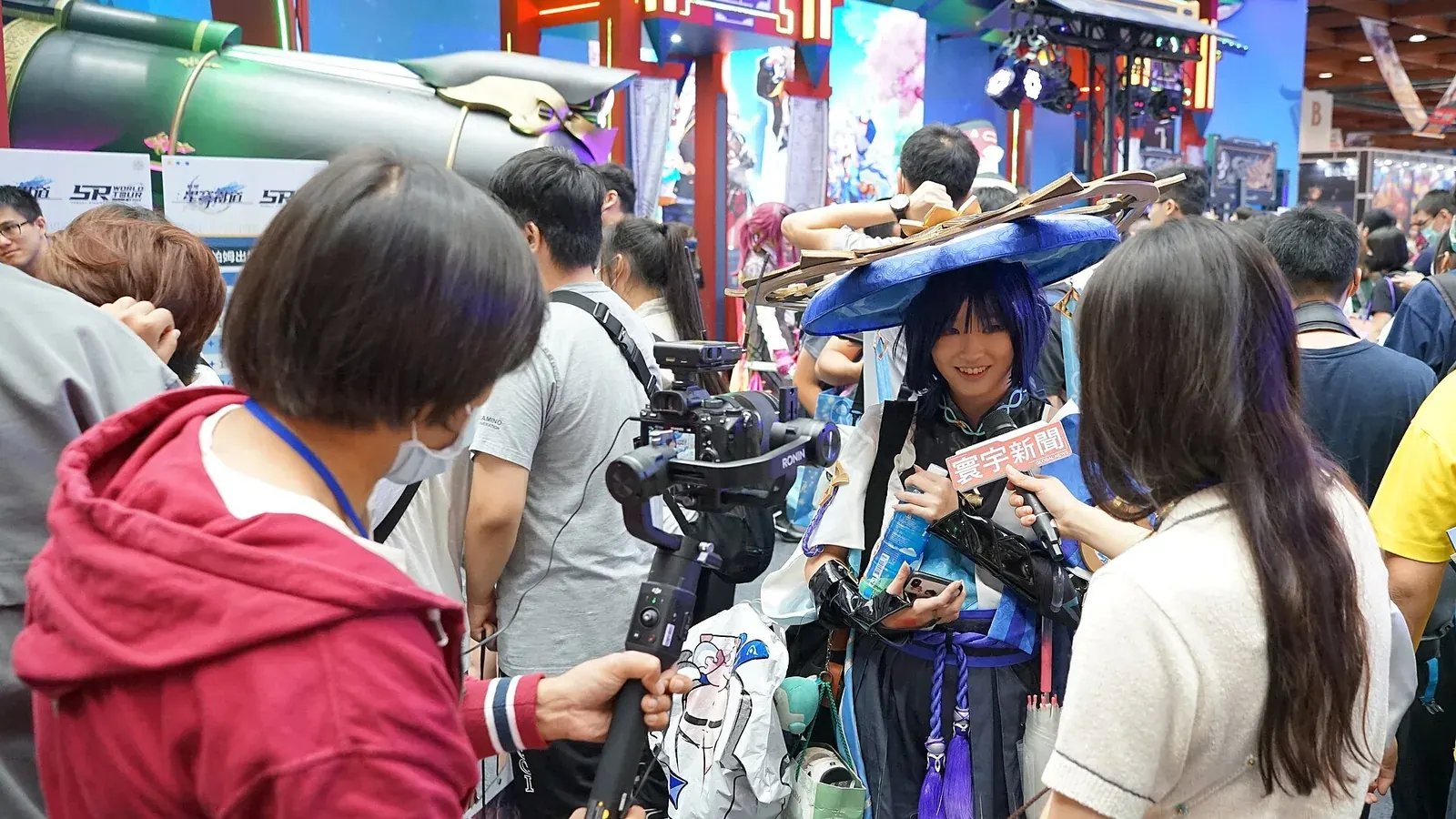 Global News journalists and Genshin Impact cosplayer at Honkai Star Rail